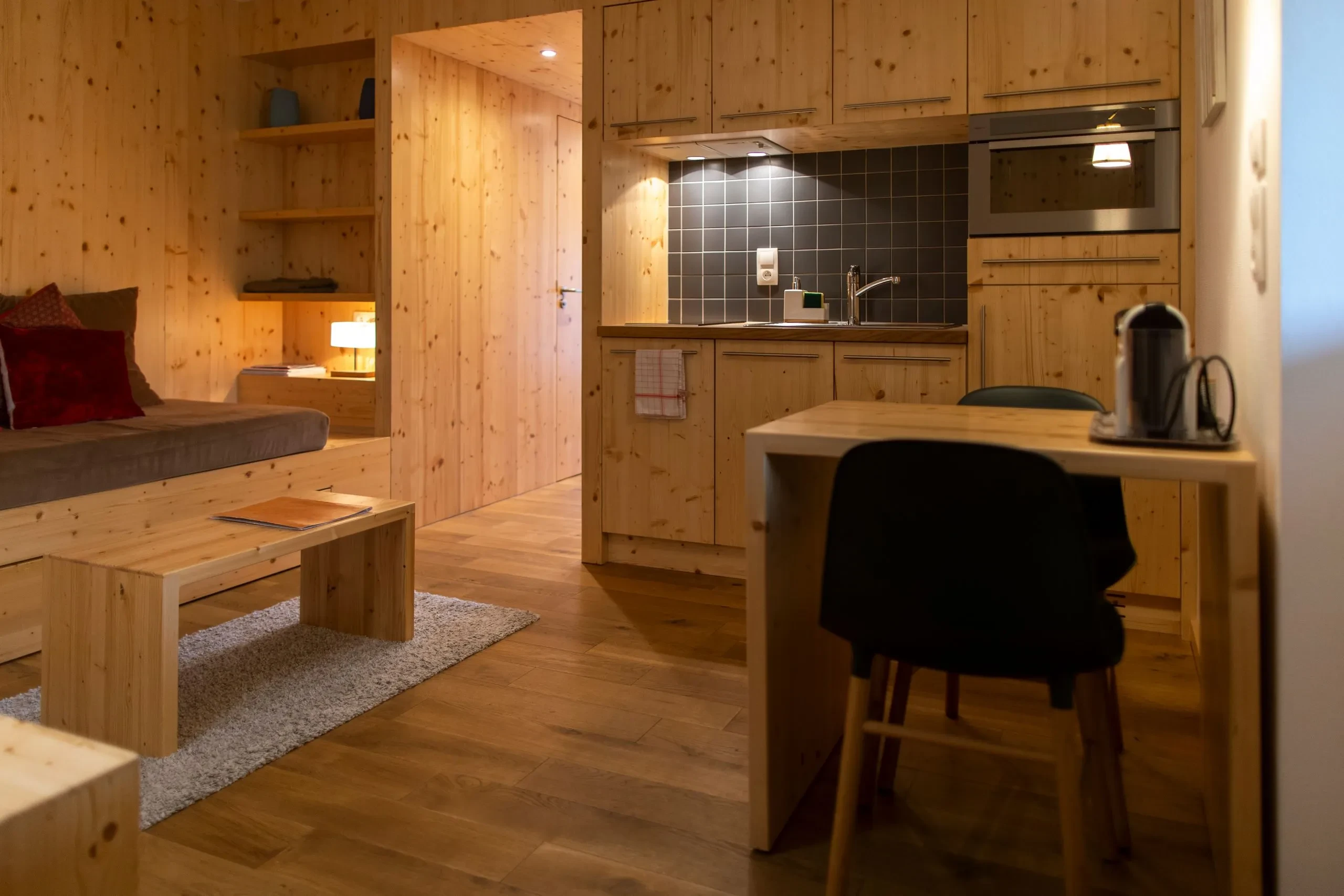 Cozy wooden interior living and kitchen area