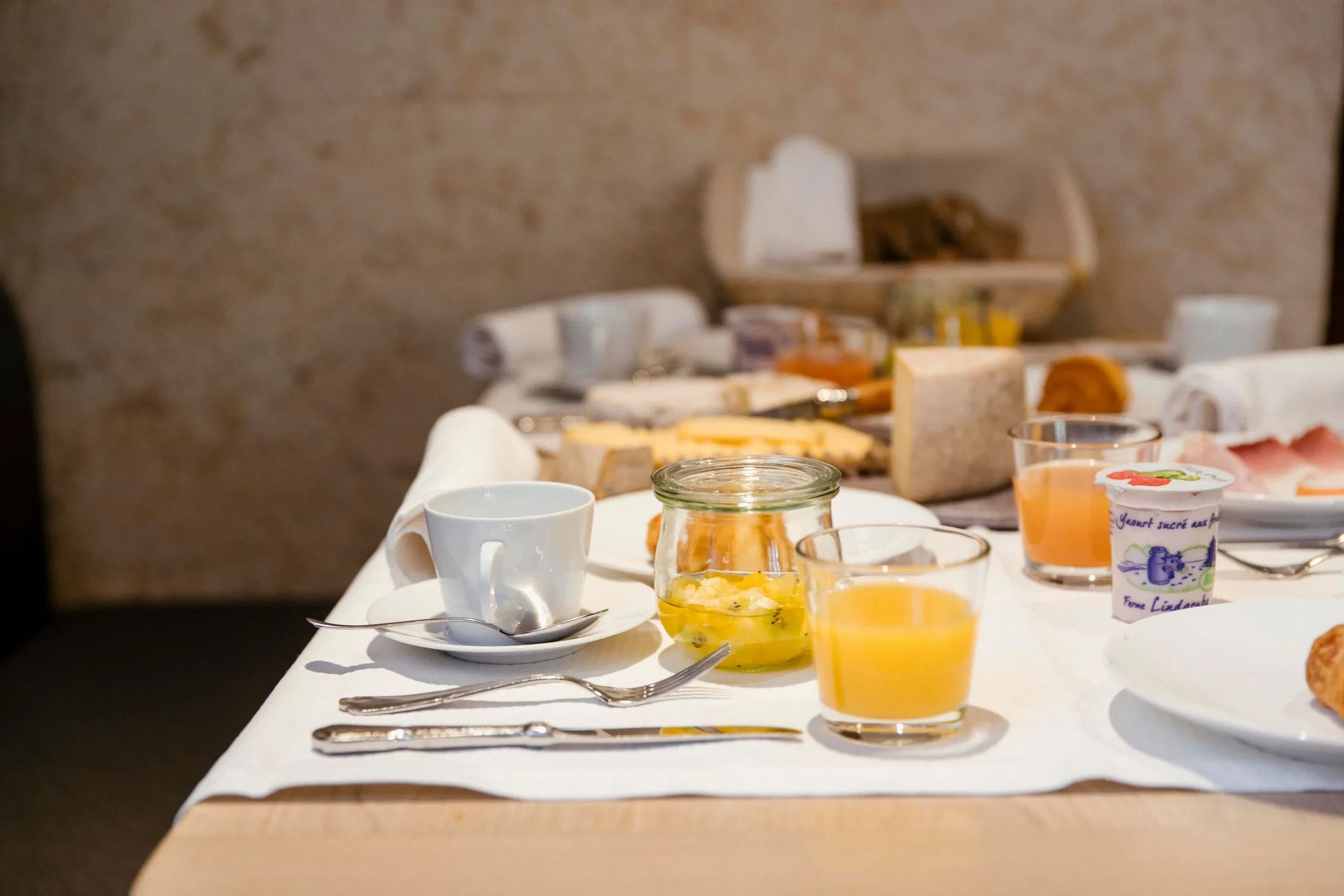 Elegant breakfast table setting with juice