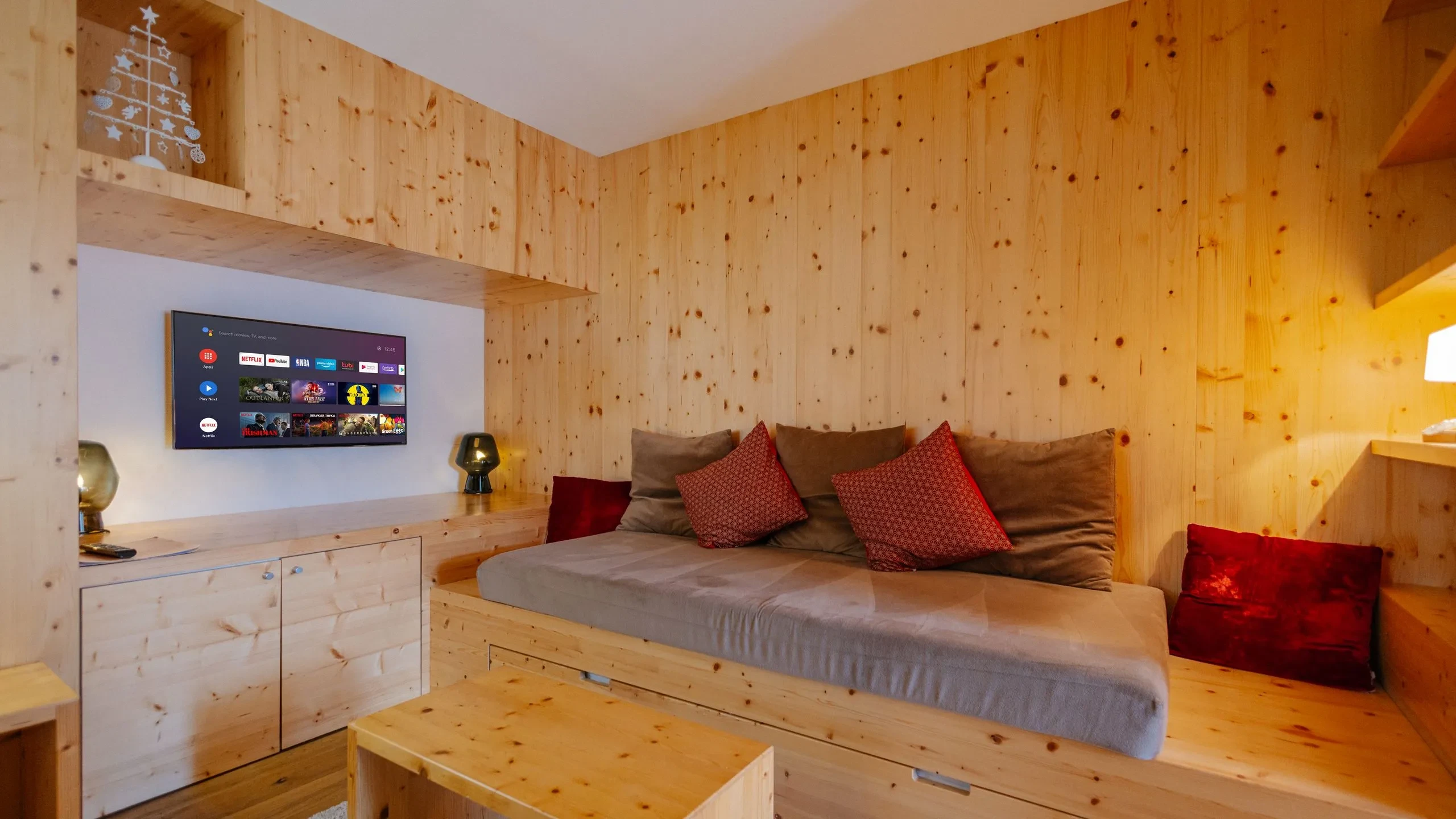 Cozy wooden room interior with TV